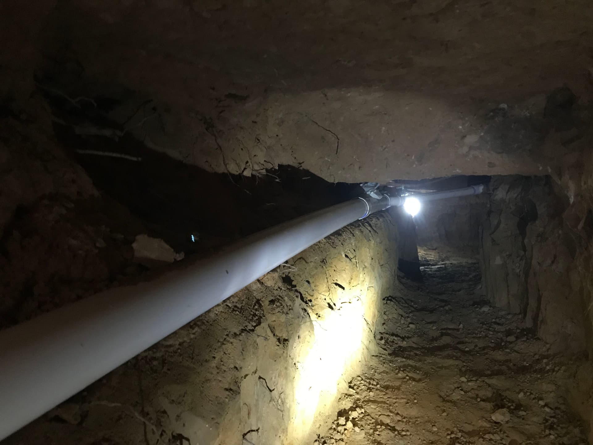 Gallery photos for Cast Iron Sewer Line Replacement Under Foundation in Bedford: Image #1