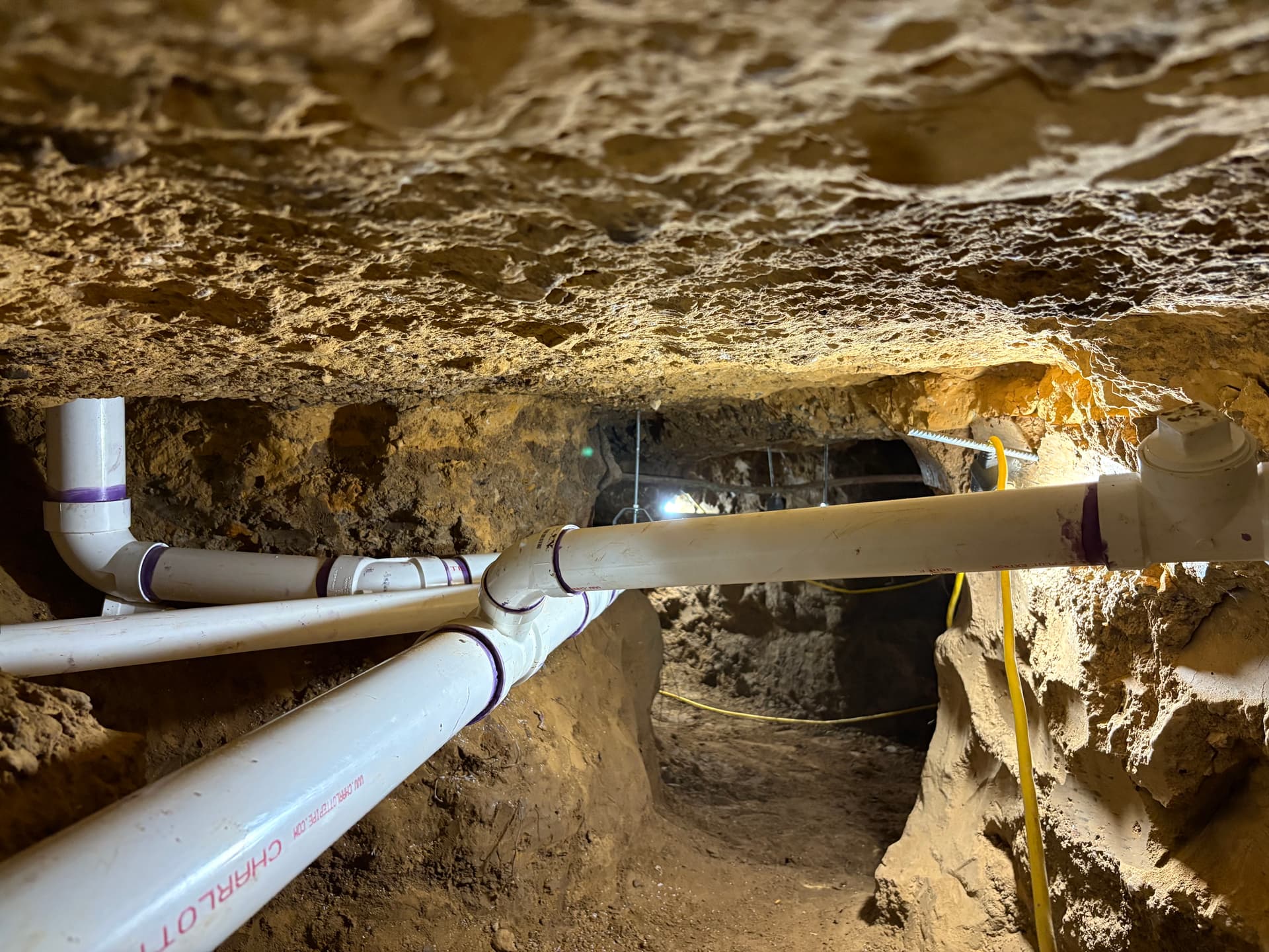 Gallery photos for Whole-Home Sewer Repipe Done Right Through Tunnel Access: Image #2