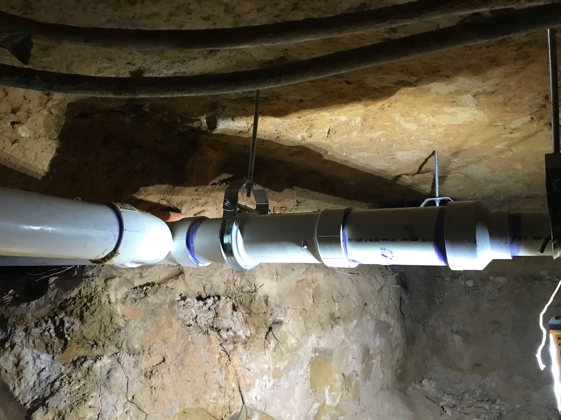 Gallery photos for Cast Iron Sewer Line Replacement Under Foundation in Bedford: Image #3