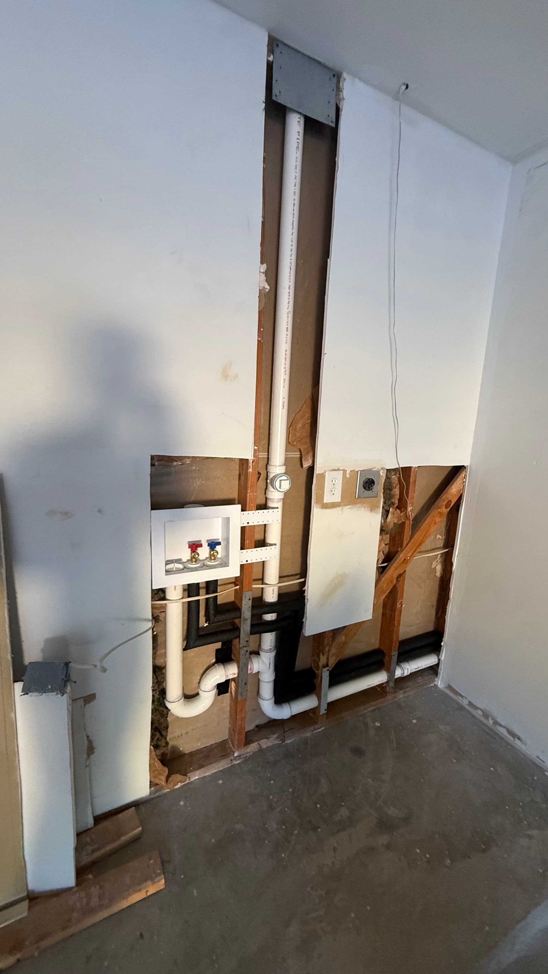 Washer Drain Reroute and Sewer Tie-In for Bedford Homeowner image