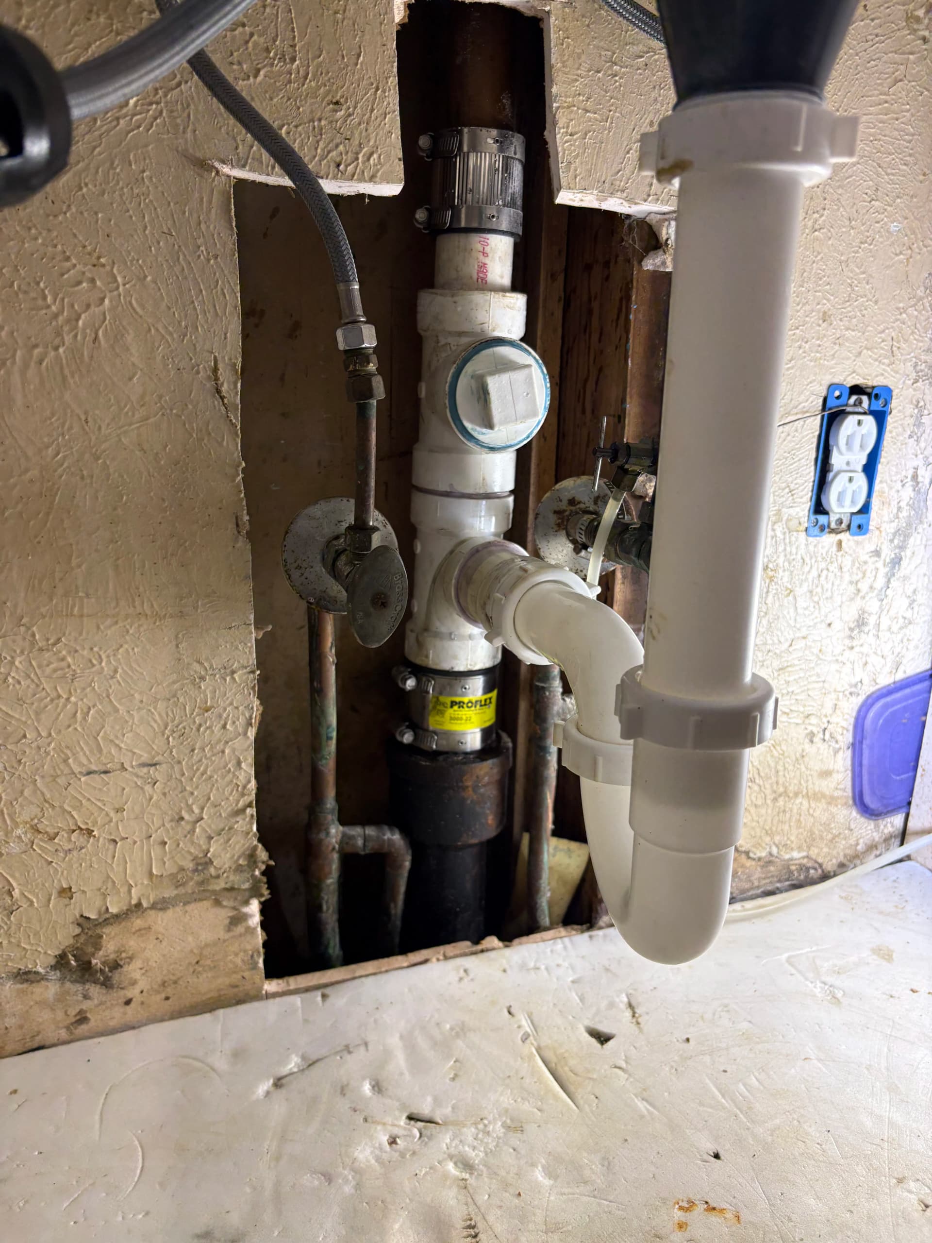 Broken Drain Line Repair Behind Kitchen Sink Wall in Saginaw image