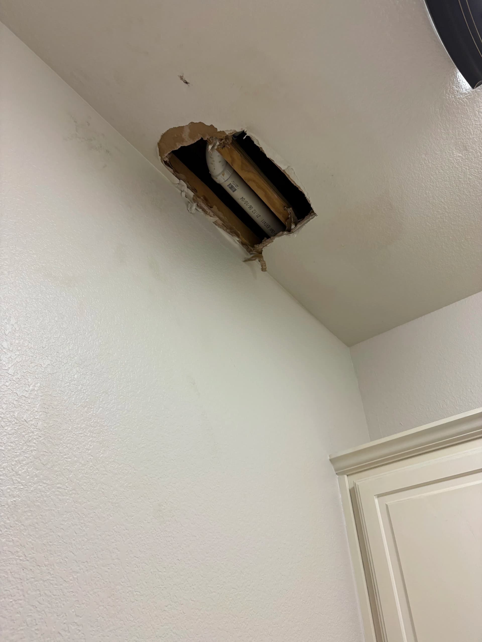 Tub Spout Diverter Leak Causing Ceiling Damage in Hurst image